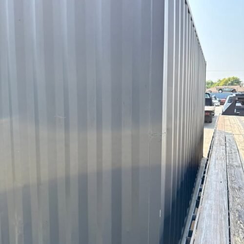 20ft Used Shipping Container – Matte Black w/ 12’ Side Roll-Up Door