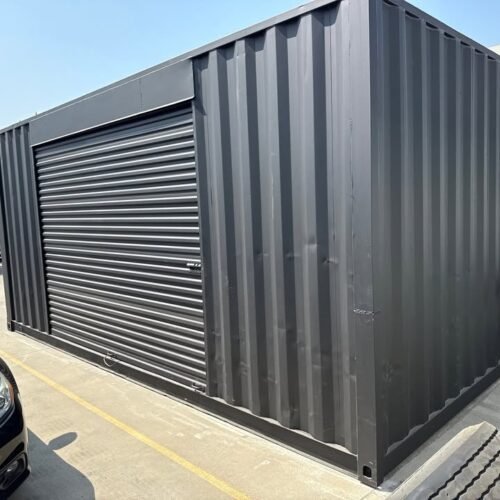 20ft Used Shipping Container – Matte Black w/ 12’ Side Roll-Up Door