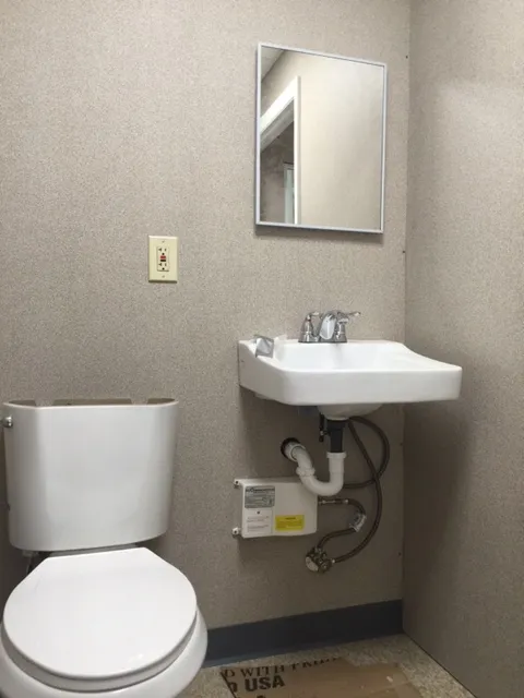 Meccon-8x14Guardhouse-Restroom-1.webp Guard Booth with Restroom