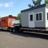Meccon-8x14Guardhouse-Restroom-shipped.webp Guard Booth with Restroom