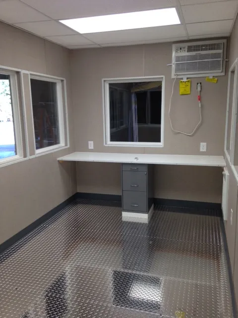 PaulReillyCo-8x12FaureciaGuardhouse-Completion2-2-1.webp 8 x 20 Guard Booth